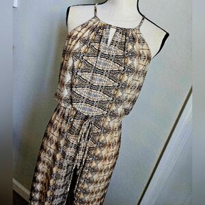 Jump Suit Animal Print tan, brown,cream & black  size 2